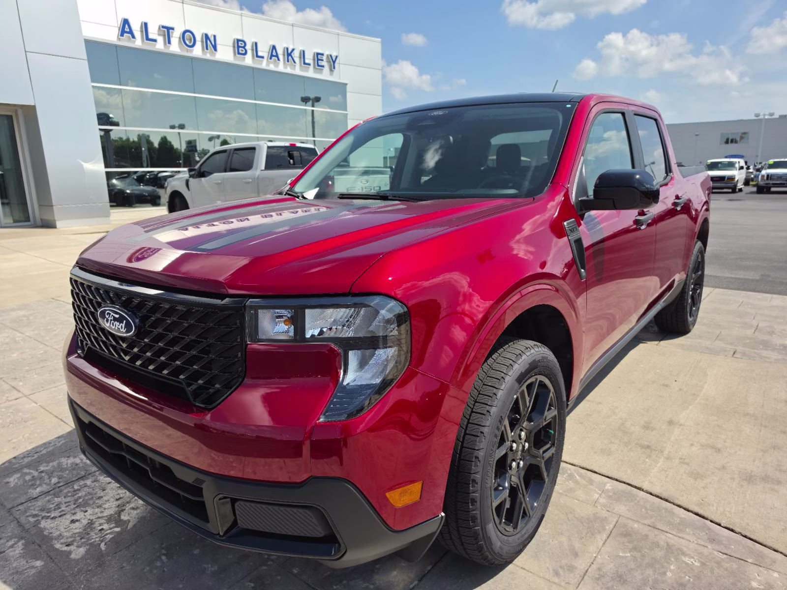 2026 Ruby Red Metallic Tinted Clearcoat Ford Maverick XLT AWD Truck