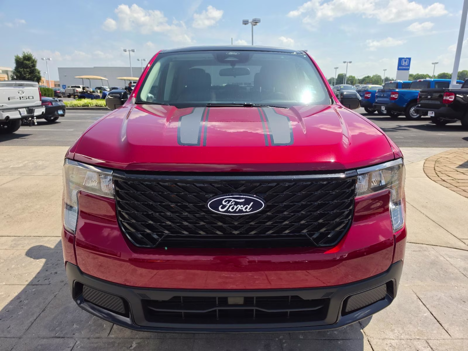 2026 Ruby Red Metallic Tinted Clearcoat Ford Maverick XLT AWD Truck