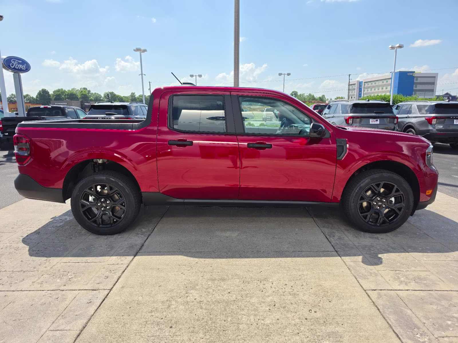 2026 Ruby Red Metallic Tinted Clearcoat Ford Maverick XLT AWD Truck