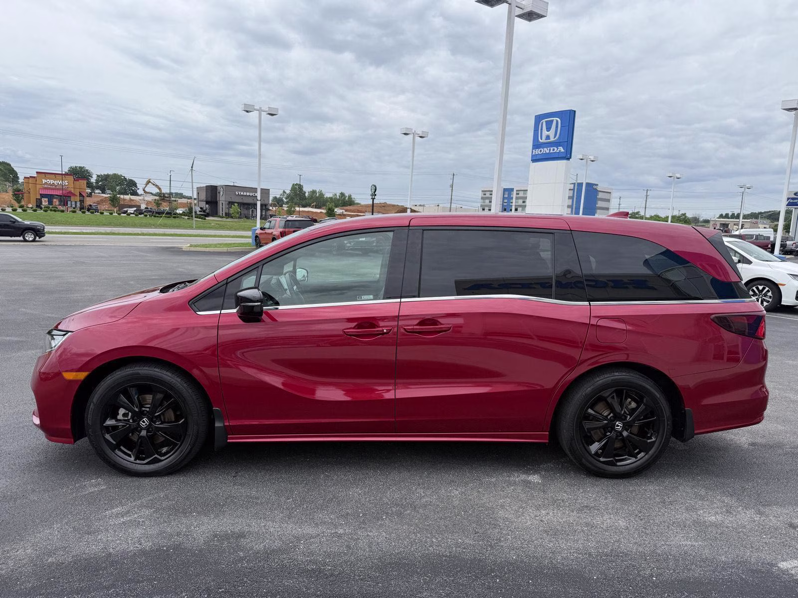 2023 Radiant Red Metallic II Honda Odyssey Sport FWD Van