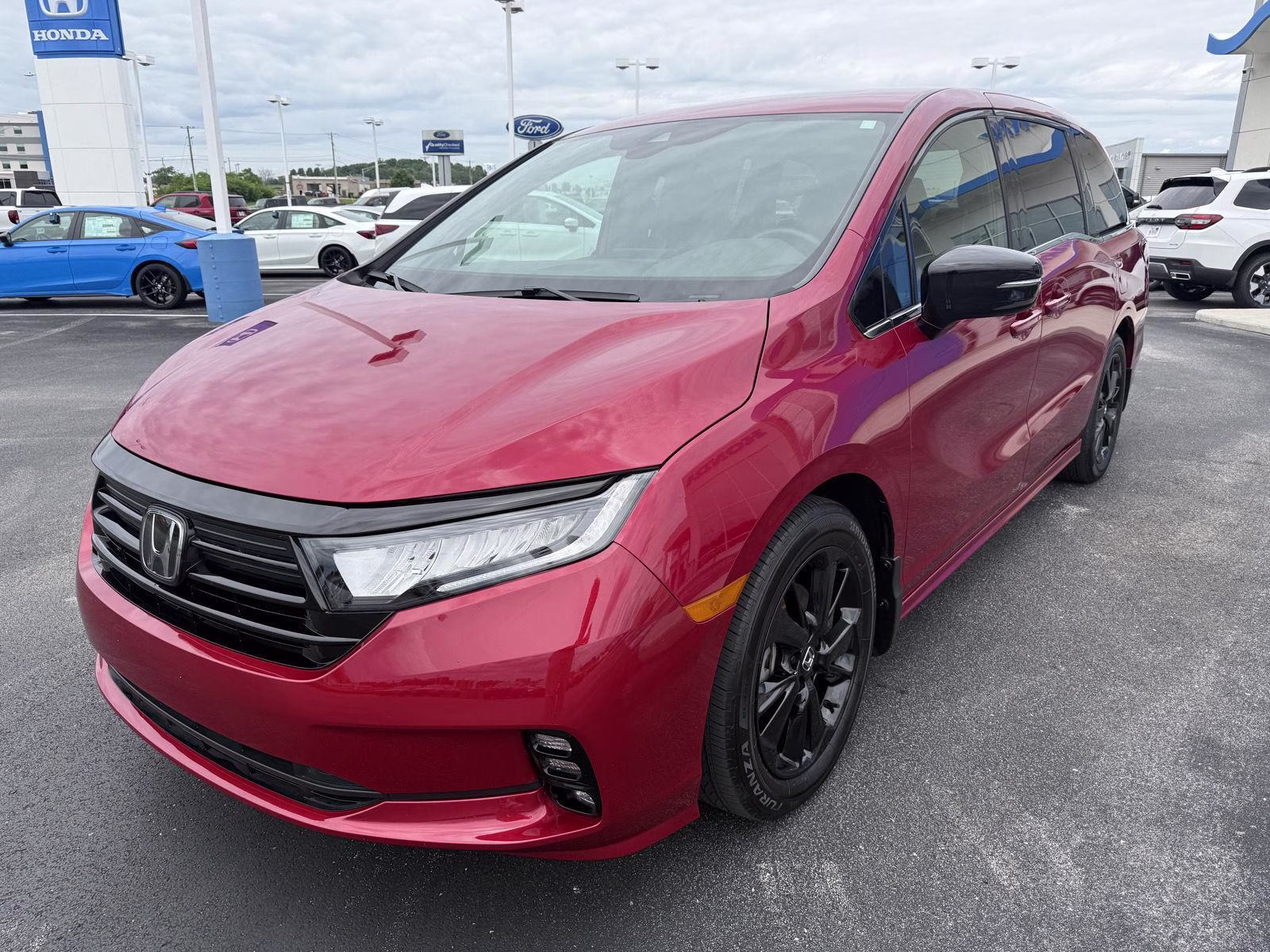 2023 Radiant Red Metallic II Honda Odyssey Sport FWD Van