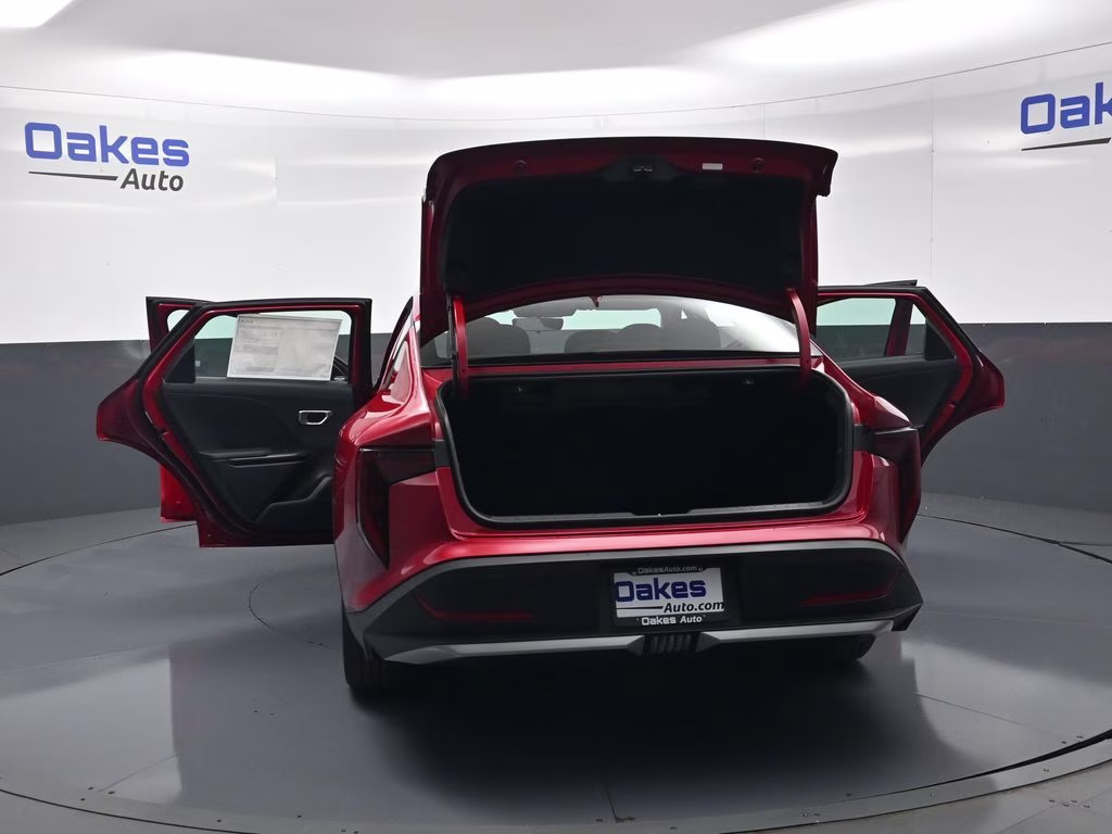 2026 Currant Red Kia K4 LXS FWD Sedan