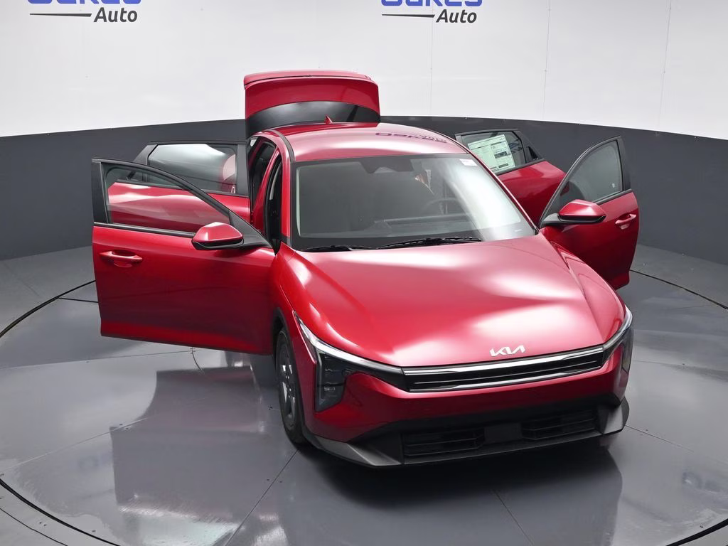 2026 Currant Red Kia K4 LXS FWD Sedan
