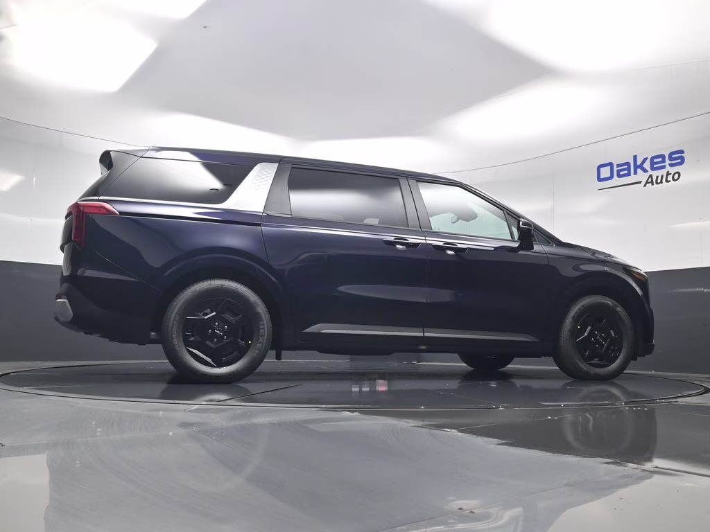 2026 Deep Chroma Blue Kia Carnival LXS FWD Van