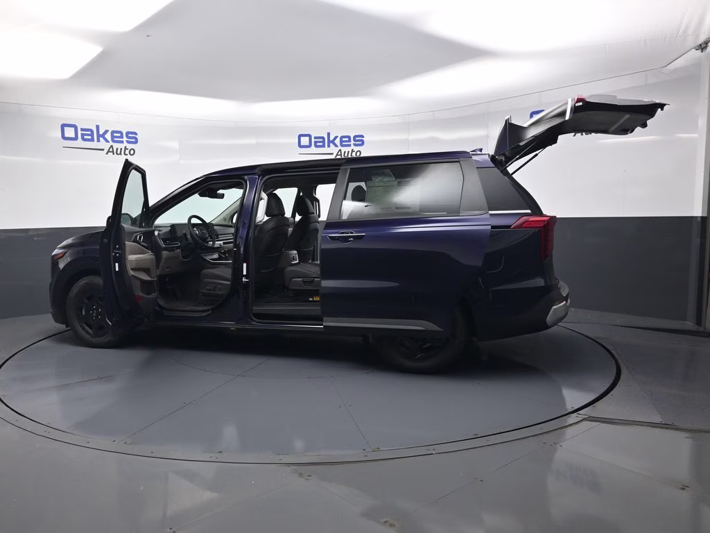 2026 Deep Chroma Blue Kia Carnival LXS FWD Van