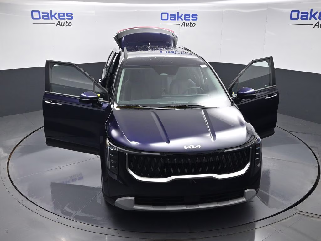 2026 Deep Chroma Blue Kia Carnival LXS FWD Van