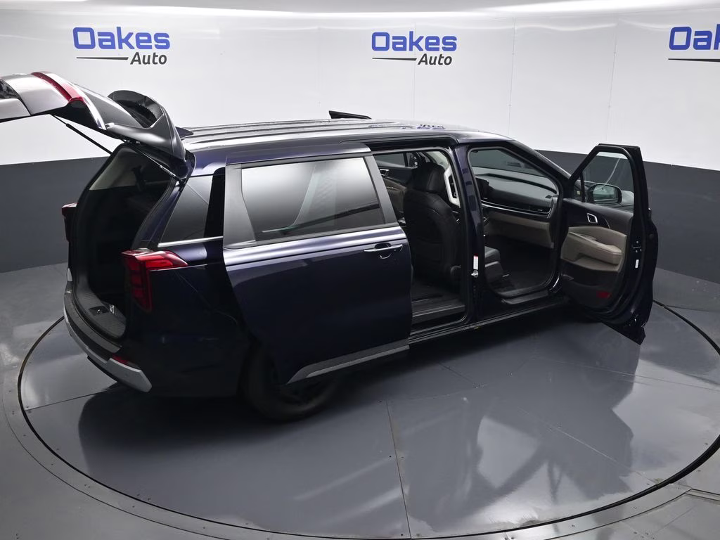 2026 Deep Chroma Blue Kia Carnival LXS FWD Van