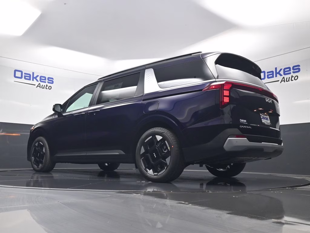 2026 Deep Chroma Blue Kia Carnival EX FWD Van