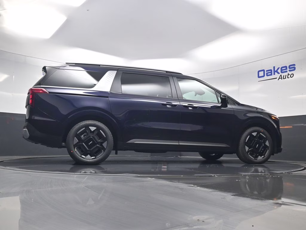 2026 Deep Chroma Blue Kia Carnival EX FWD Van