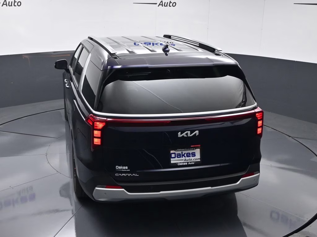 2026 Deep Chroma Blue Kia Carnival EX FWD Van