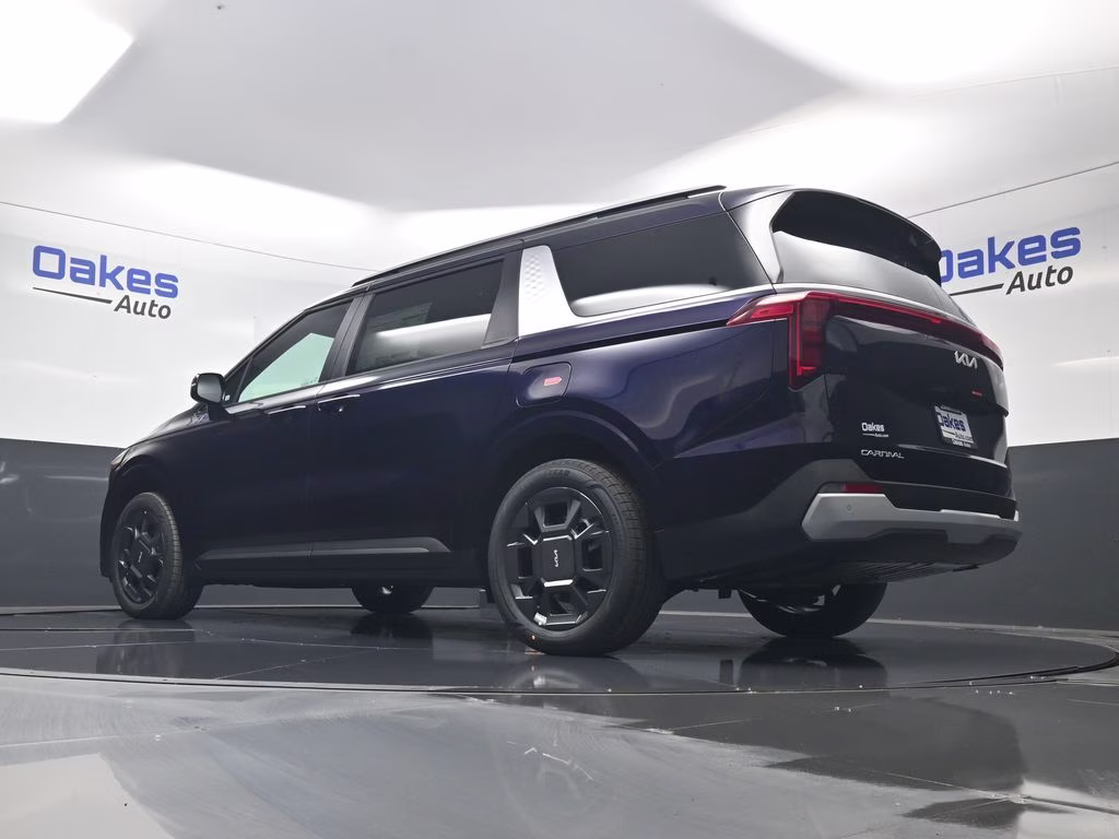 2026 Deep Chroma Blue Kia Carnival Hybrid EX FWD Van