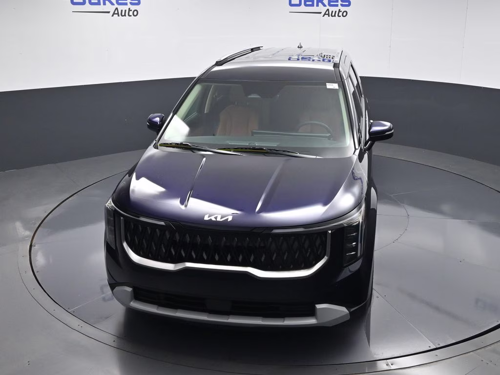 2026 Deep Chroma Blue Kia Carnival Hybrid EX FWD Van