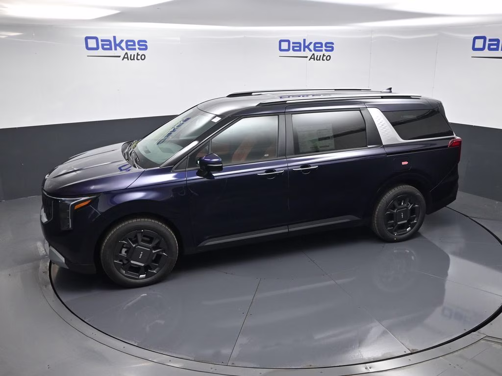 2026 Deep Chroma Blue Kia Carnival Hybrid EX FWD Van