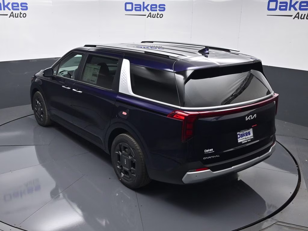 2026 Deep Chroma Blue Kia Carnival Hybrid EX FWD Van