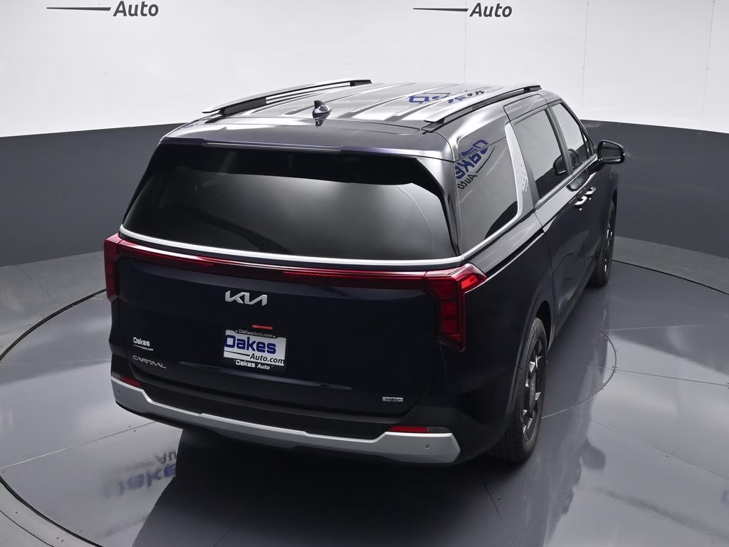 2026 Deep Chroma Blue Kia Carnival Hybrid EX FWD Van