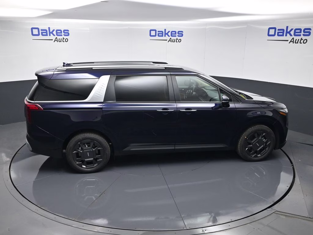2026 Deep Chroma Blue Kia Carnival Hybrid EX FWD Van