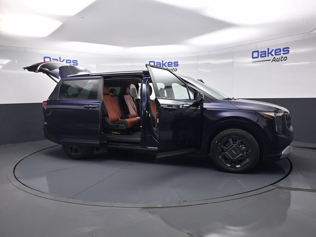 2026 Deep Chroma Blue Kia Carnival Hybrid EX FWD Van