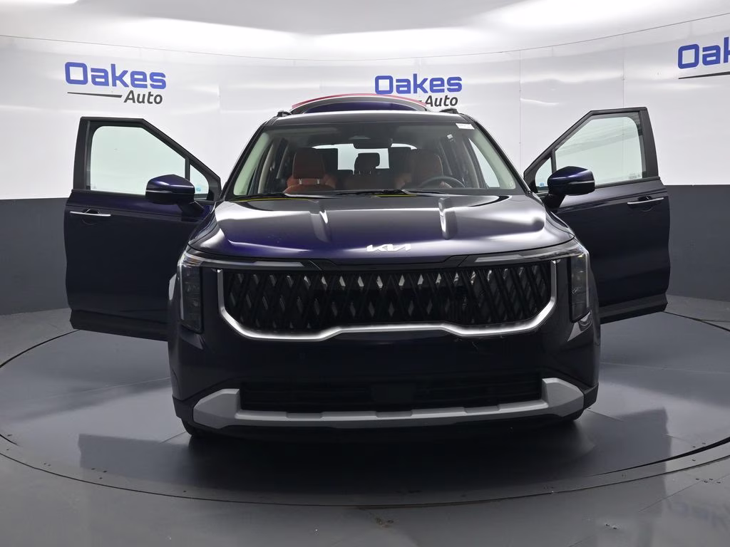 2026 Deep Chroma Blue Kia Carnival Hybrid EX FWD Van