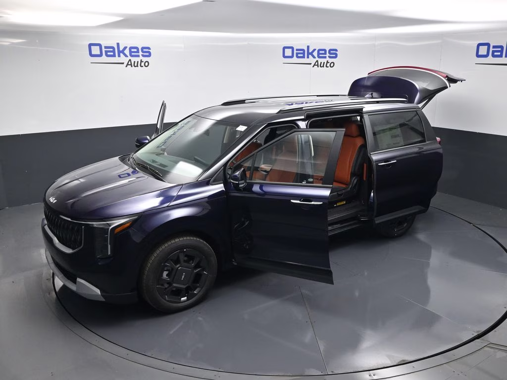 2026 Deep Chroma Blue Kia Carnival Hybrid EX FWD Van