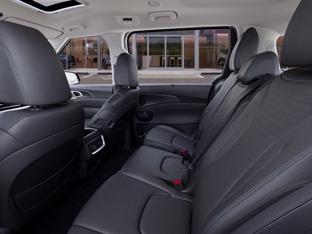 2026 Snow White Pearl Kia Carnival SX Prestige FWD Van