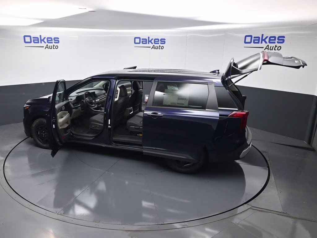 2026 Deep Chroma Blue Kia Carnival LXS FWD Van