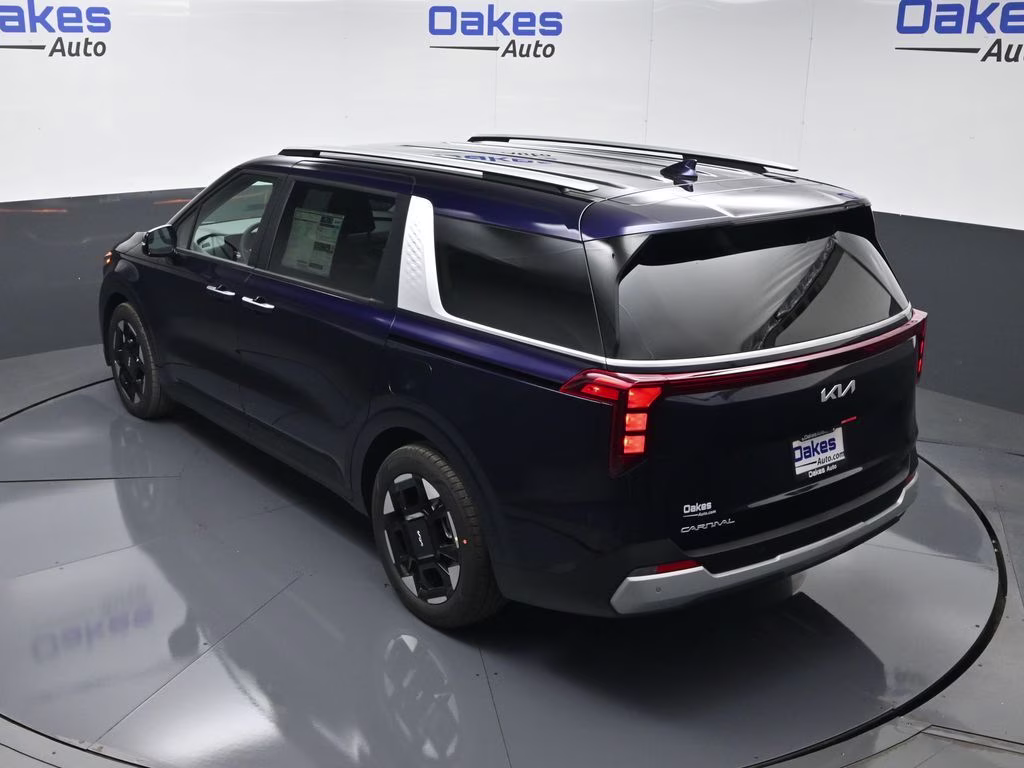 2026 Deep Chroma Blue Kia Carnival EX FWD Van