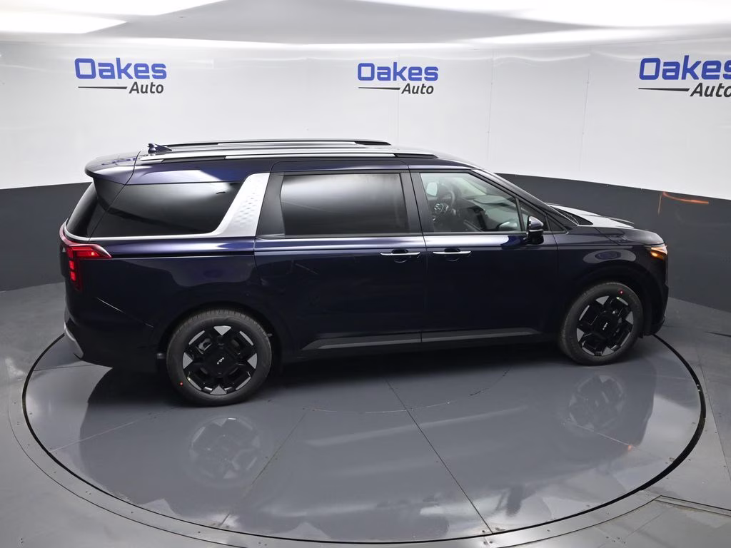 2026 Deep Chroma Blue Kia Carnival EX FWD Van
