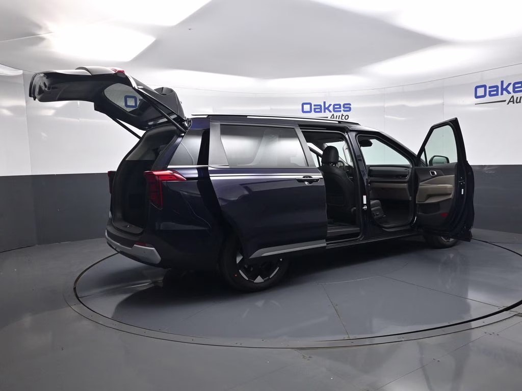 2026 Deep Chroma Blue Kia Carnival EX FWD Van