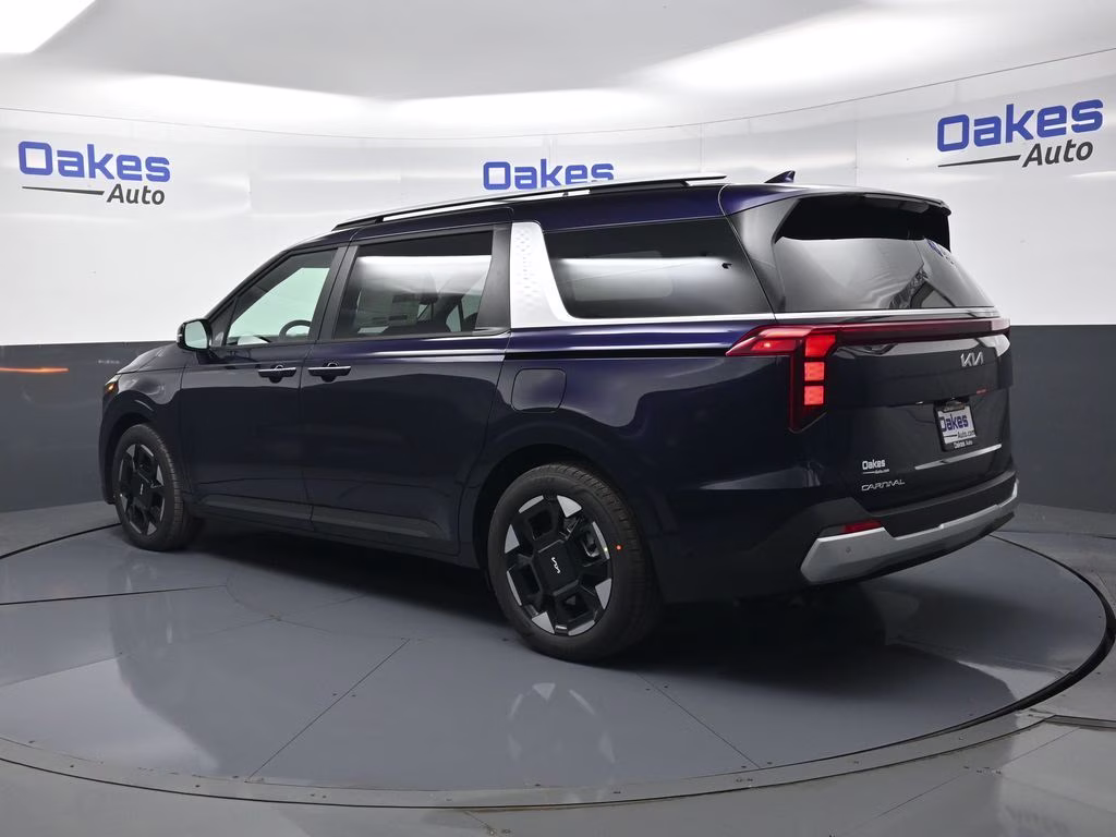 2026 Deep Chroma Blue Kia Carnival EX FWD Van