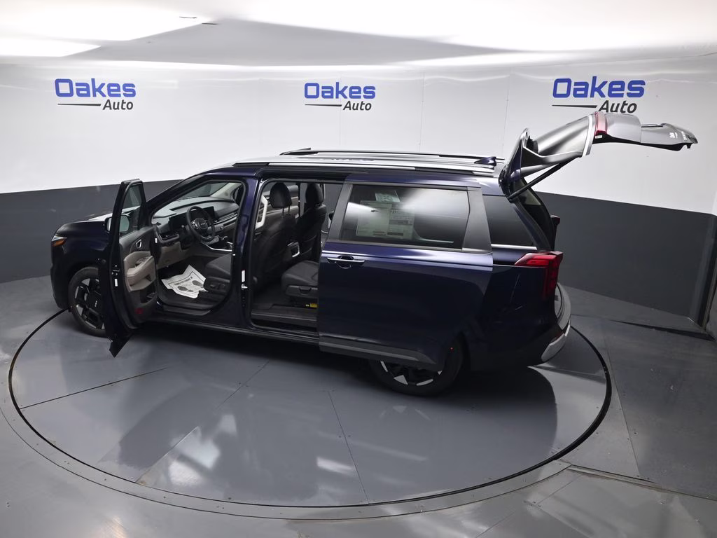 2026 Deep Chroma Blue Kia Carnival EX FWD Van