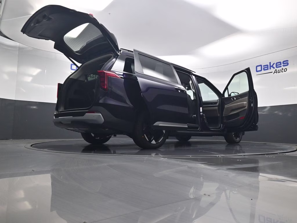 2026 Deep Chroma Blue Kia Carnival EX FWD Van