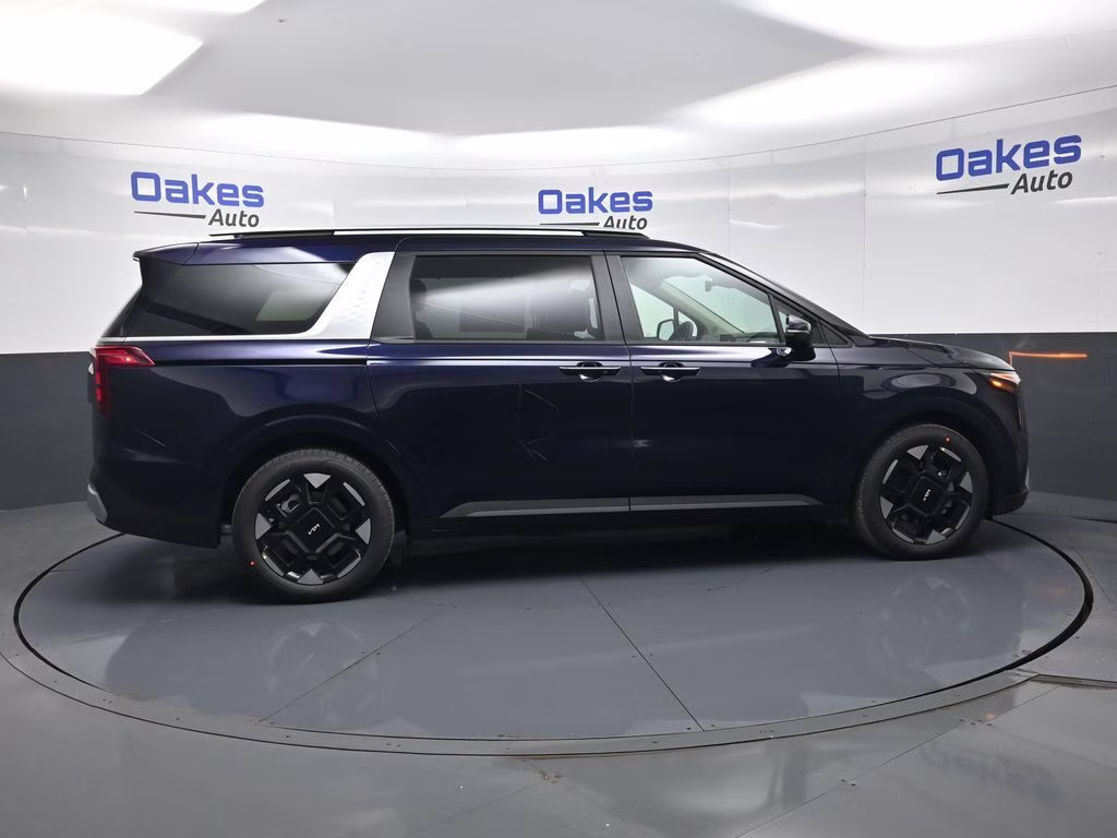 2026 Deep Chroma Blue Kia Carnival EX FWD Van
