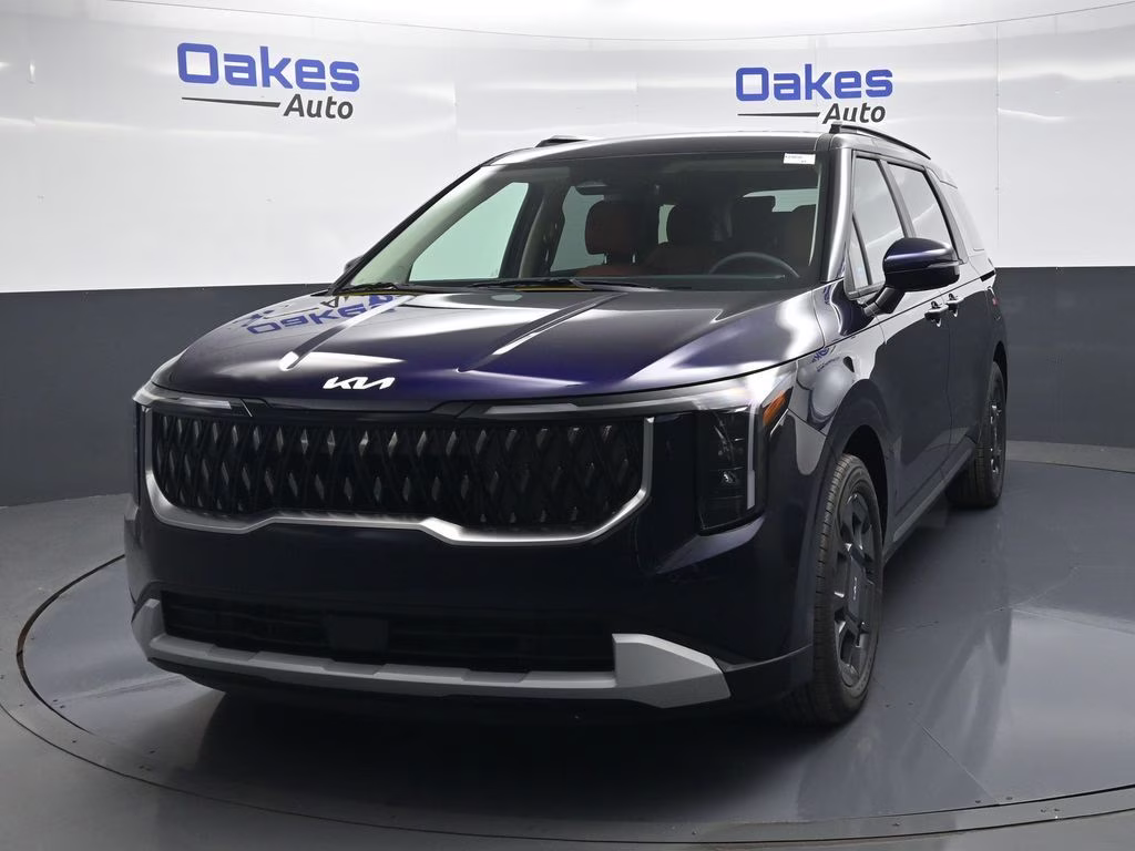 2026 Deep Chroma Blue Kia Carnival Hybrid EX FWD Van