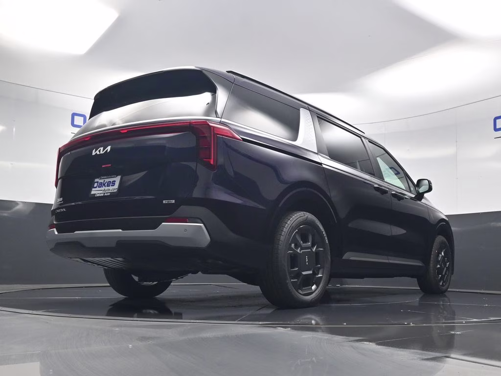 2026 Deep Chroma Blue Kia Carnival Hybrid EX FWD Van