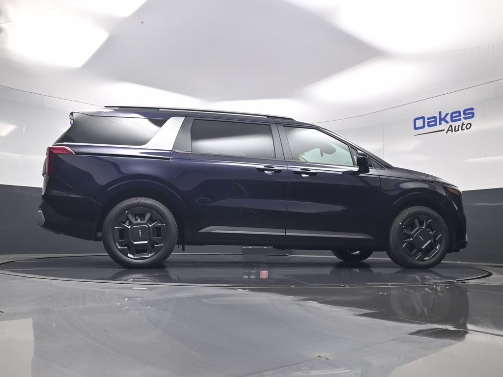 2026 Deep Chroma Blue Kia Carnival Hybrid EX FWD Van