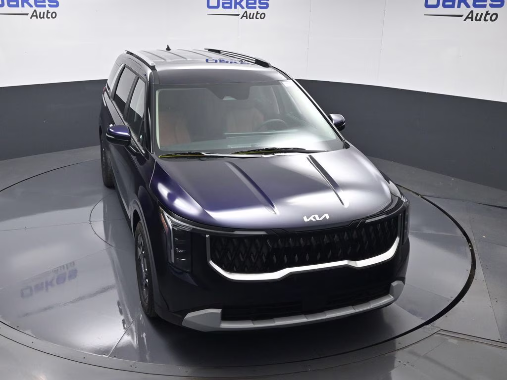 2026 Deep Chroma Blue Kia Carnival Hybrid EX FWD Van