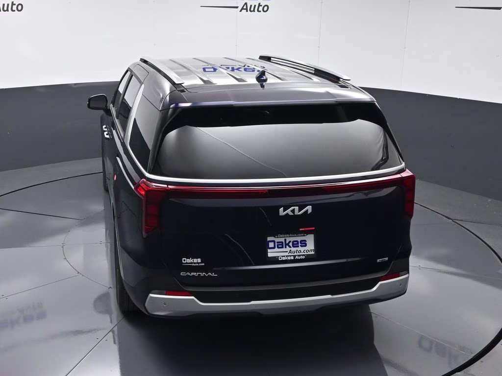 2026 Deep Chroma Blue Kia Carnival Hybrid EX FWD Van