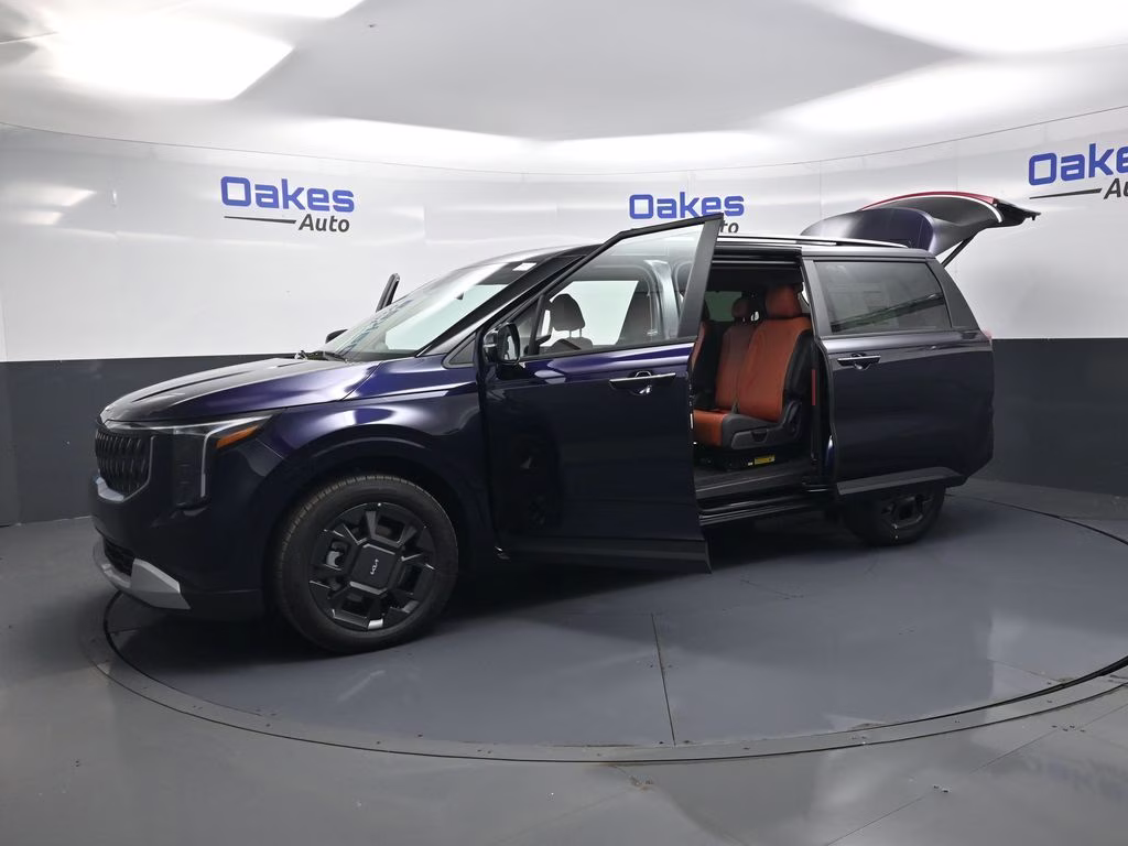 2026 Deep Chroma Blue Kia Carnival Hybrid EX FWD Van