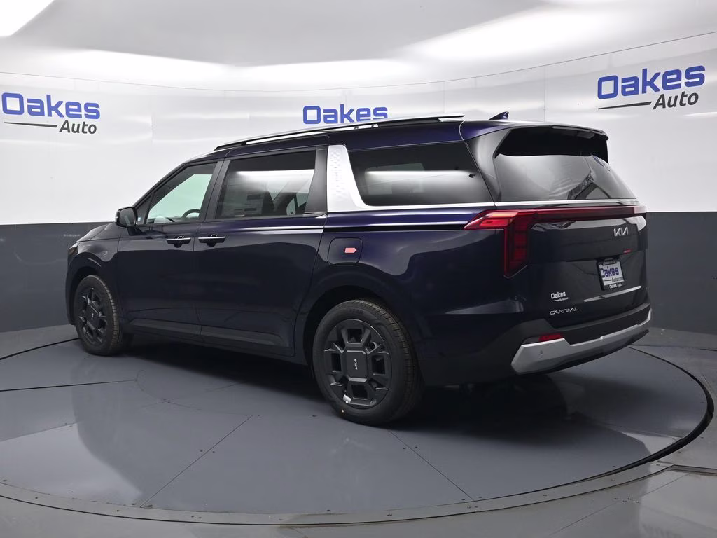 2026 Deep Chroma Blue Kia Carnival Hybrid EX FWD Van
