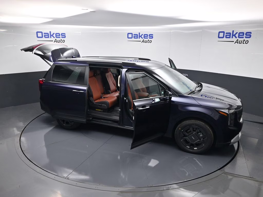 2026 Deep Chroma Blue Kia Carnival Hybrid EX FWD Van
