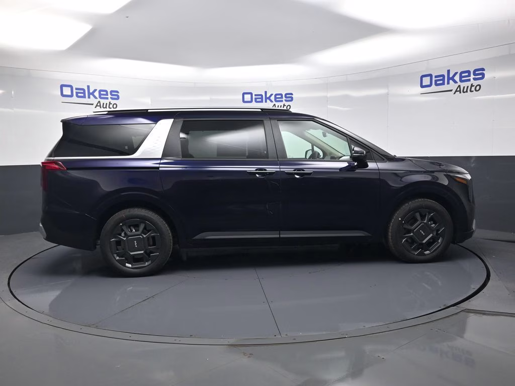 2026 Deep Chroma Blue Kia Carnival Hybrid EX FWD Van