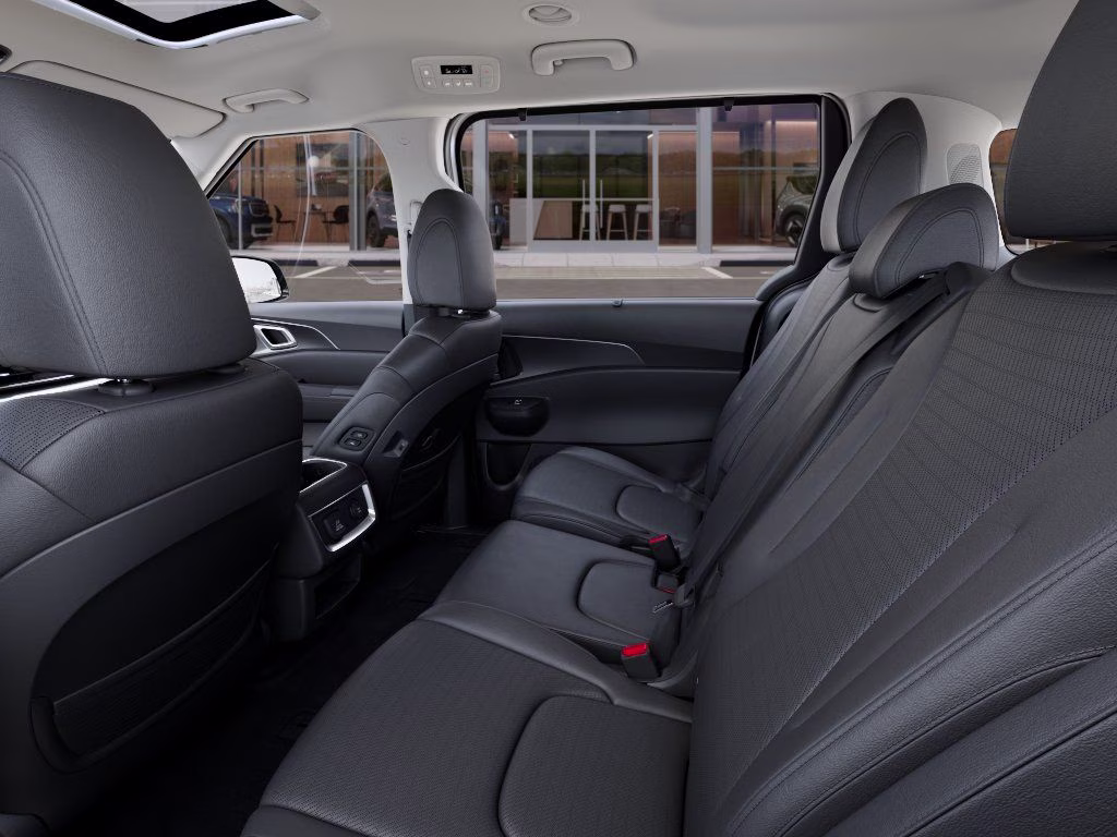 2026 Snow White Pearl Kia Carnival SX Prestige FWD Van