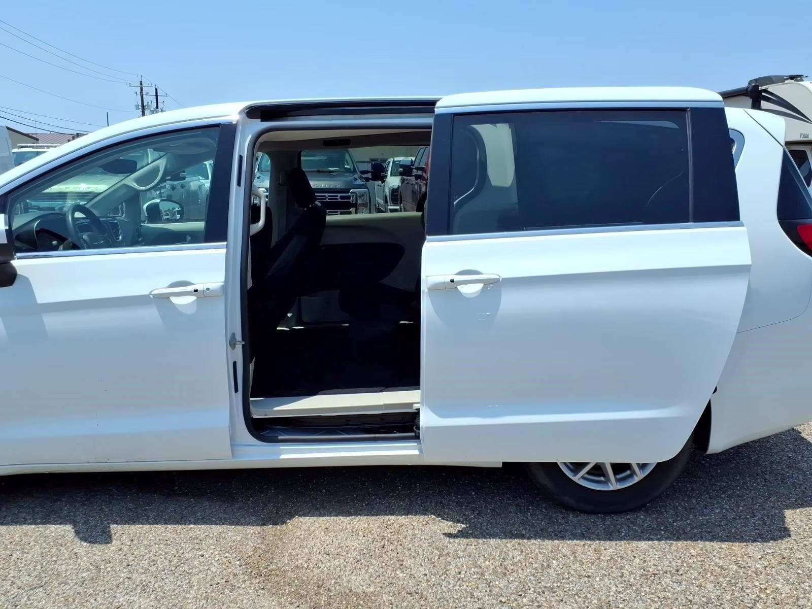 2023 Bright White Clearcoat Chrysler Voyager LX FWD Van