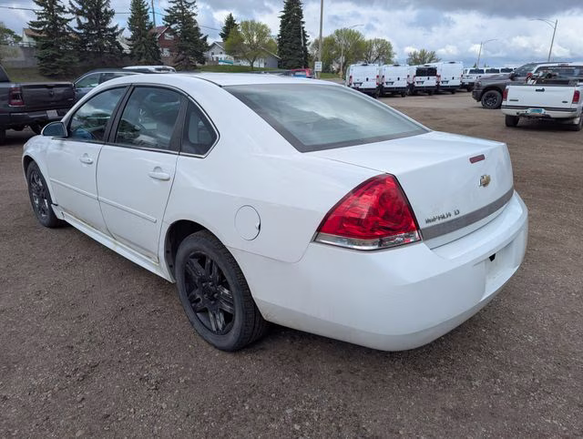 2010 Summit White Chevrolet Impala LT FWD Sedan