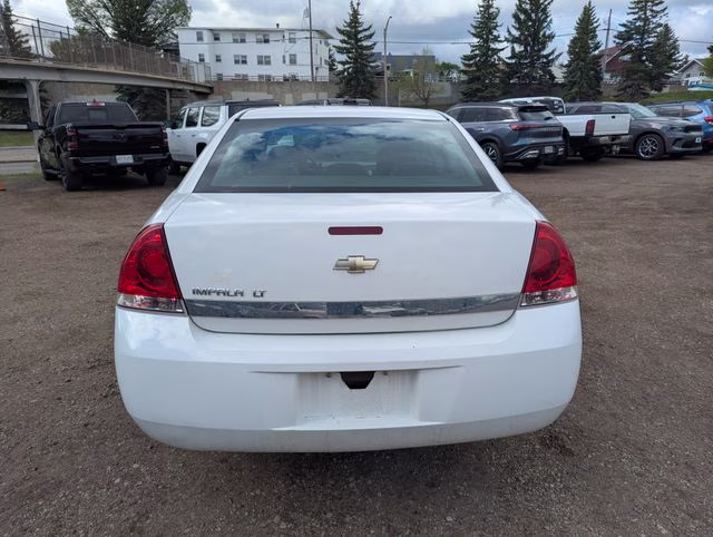2010 Summit White Chevrolet Impala LT FWD Sedan