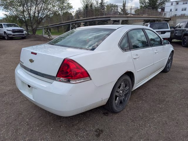 2010 Summit White Chevrolet Impala LT FWD Sedan