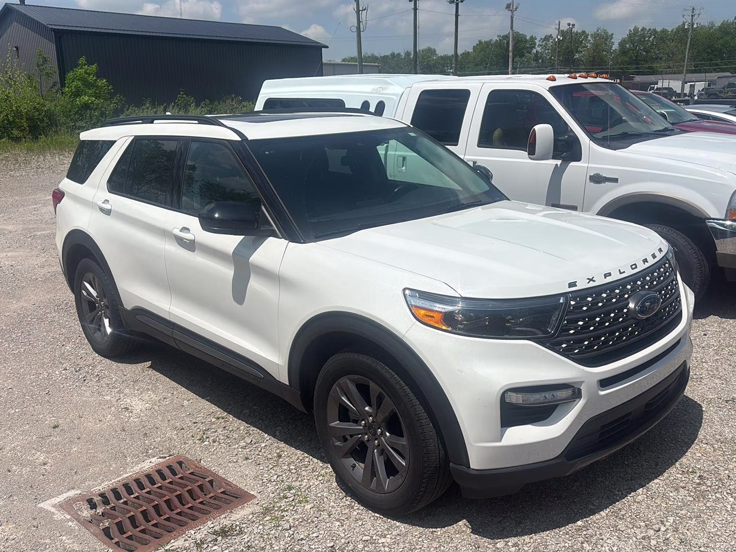 2023 Star White Metallic Tri-Coat Ford Explorer XLT 4X4 SUV