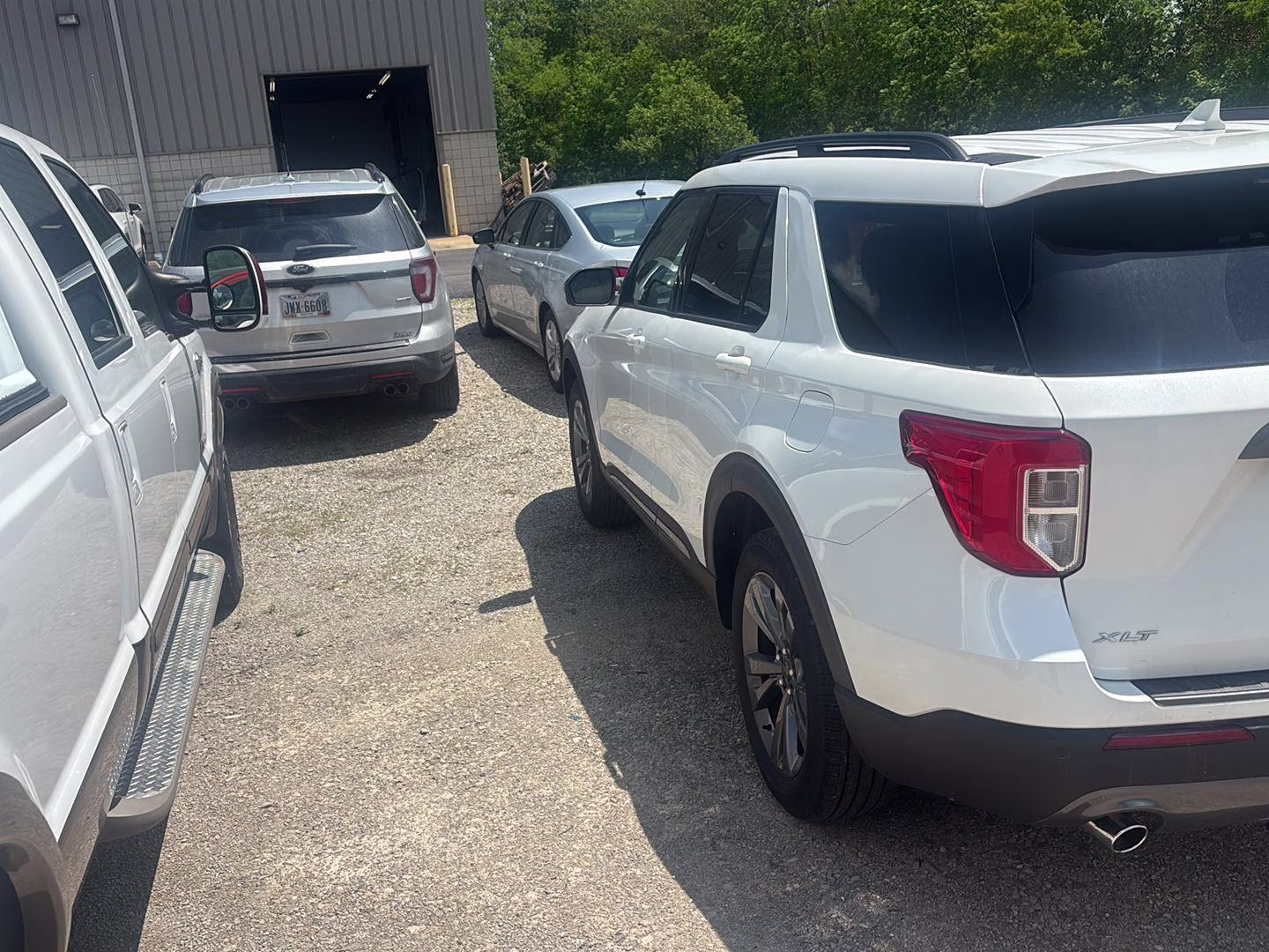 2023 Star White Metallic Tri-Coat Ford Explorer XLT 4X4 SUV