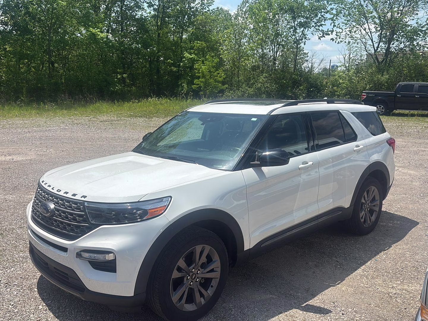 2023 Star White Metallic Tri-Coat Ford Explorer XLT 4X4 SUV