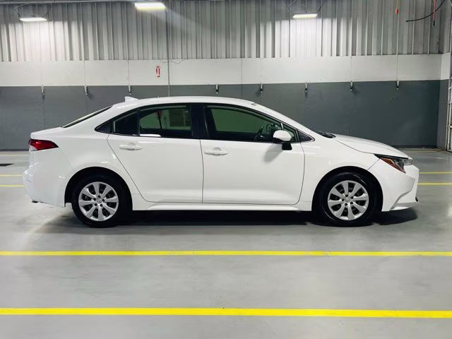 2022 White Toyota Corolla LE FWD Sedan